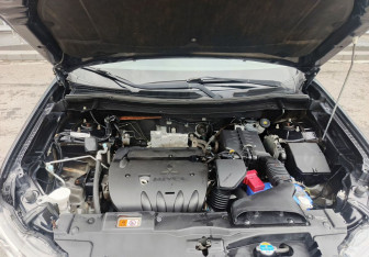 Подержанный автомобиль Mitsubishi Outlander 2013 года (11 фото)