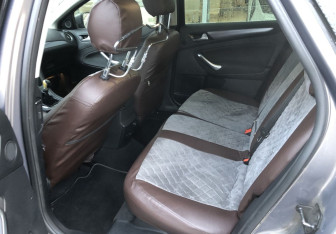 Подержанный автомобиль Ford Mondeo Sedan 2011 года (11 фото)