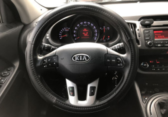 Подержанный автомобиль Kia Sportage 2012 года (13 фото)