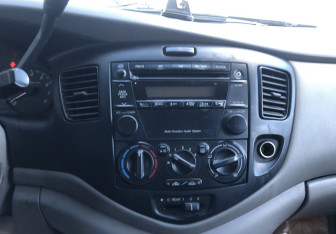 Подержанный автомобиль Mazda MPV 2002 года (14 фото)