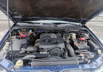 Подержанный автомобиль Mitsubishi Pajero Sport 2014 года (11 фото)