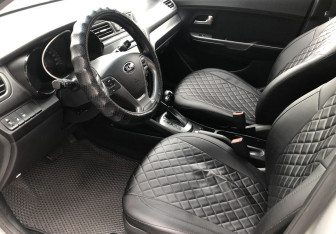 Подержанный автомобиль Kia Rio Sedan 2015 года (9 фото)