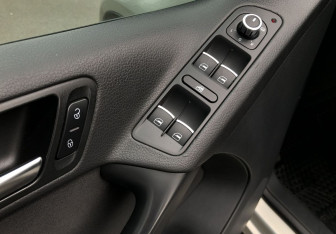 Подержанный автомобиль Volkswagen Tiguan 2010 года (13 фото)