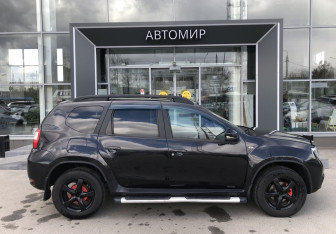 Подержанный автомобиль Nissan Terrano 2014 года (4 фото)