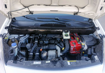 Подержанный автомобиль Peugeot Partner 2013 года (11 фото)