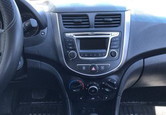 Подержанный автомобиль Hyundai Solaris Sedan 2014 года (14 фото)