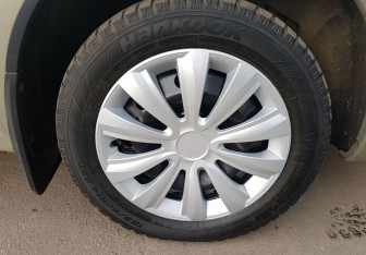 Подержанный автомобиль Renault Logan Sedan 2011 года (12 фото)