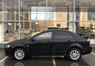 Подержанный автомобиль Mitsubishi Lancer Sedan 2012 года (8 фото)