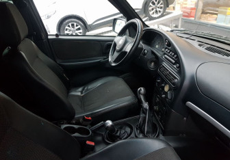 Подержанный автомобиль Chevrolet Niva 2012 года (9 фото)