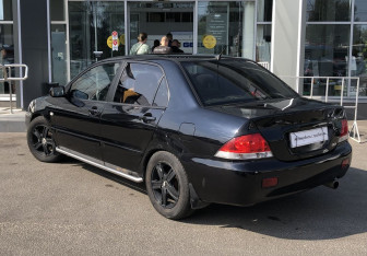 Подержанный автомобиль Mitsubishi Lancer Sedan 2007 года (7 фото)