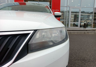 Подержанный автомобиль Skoda Rapid Liftback 2015 года (9 фото)