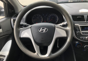 Подержанный автомобиль Hyundai Solaris Sedan 2013 года (12 фото)