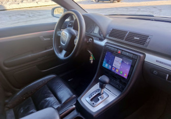 Подержанный автомобиль Audi A4 Sedan 2004 года (14 фото)