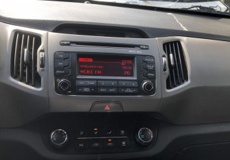 Подержанный автомобиль Kia Sportage 2014 года (14 фото)