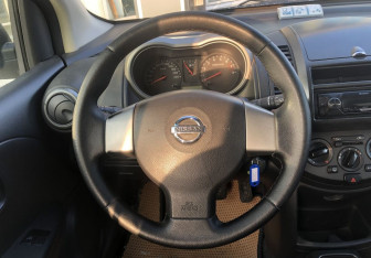 Подержанный автомобиль Nissan Note 2008 года (11 фото)