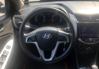 Подержанный автомобиль Hyundai Solaris Sedan 2012 года (12 фото)