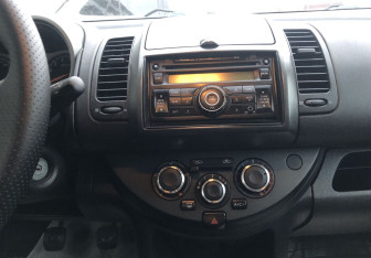 Подержанный автомобиль Nissan Note 2007 года (14 фото)