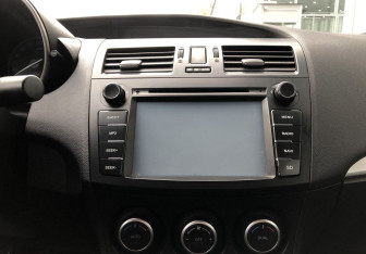 Подержанный автомобиль Mazda 3 Sedan 2012 года (14 фото)