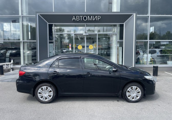 Подержанный автомобиль Toyota Corolla Sedan 2011 года (4 фото)