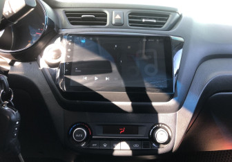 Подержанный автомобиль Kia Rio Sedan 2015 года (15 фото)