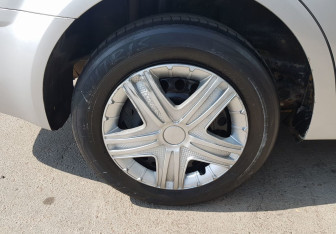 Подержанный автомобиль Chevrolet Aveo Sedan 2014 года (12 фото)