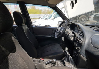 Подержанный автомобиль Chevrolet Niva 2009 года (9 фото)