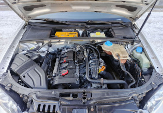 Подержанный автомобиль Audi A4 Sedan 2004 года (11 фото)