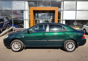 Подержанный автомобиль Toyota Corolla Sedan 2003 года (8 фото)