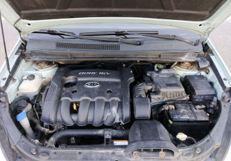 Подержанный автомобиль Kia Carens 2007 года (11 фото)