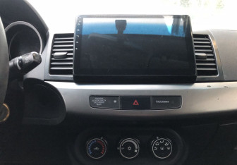 Подержанный автомобиль Mitsubishi Lancer Sedan 2012 года (14 фото)