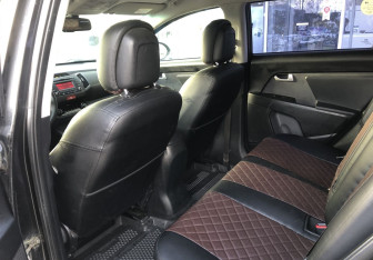 Подержанный автомобиль Kia Sportage 2011 года (11 фото)