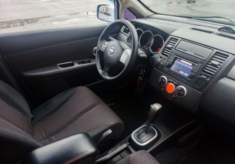 Подержанный автомобиль Nissan Tiida Sedan 2012 года (14 фото)