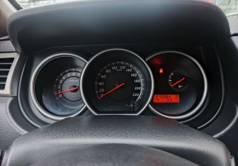 Подержанный автомобиль Nissan Tiida Sedan 2012 года (13 фото)