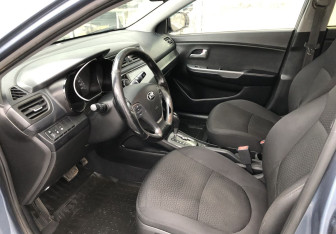 Подержанный автомобиль Kia Rio Sedan 2015 года (10 фото)