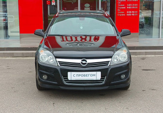 Подержанный автомобиль Opel Astra Wagon 2012 года (2 фото)