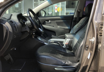 Подержанный автомобиль Kia Sportage 2014 года (9 фото)