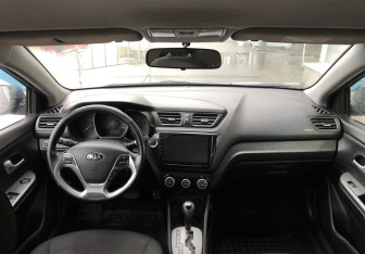 Подержанный автомобиль Kia Rio Sedan 2015 года (11 фото)