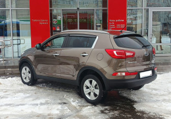 Подержанный автомобиль Kia Sportage 2011 года (7 фото)