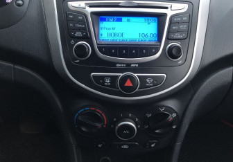 Подержанный автомобиль Hyundai Solaris Sedan 2012 года (14 фото)