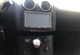 Подержанный автомобиль Nissan Qashqai 2009 года (13 фото)