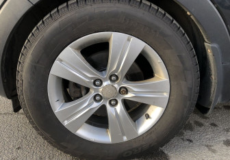 Подержанный автомобиль Kia Sportage 2011 года (16 фото)