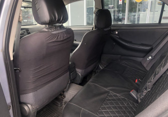 Подержанный автомобиль Toyota Corolla Sedan 2003 года (11 фото)