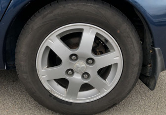 Подержанный автомобиль Mitsubishi Lancer Sedan 2005 года (16 фото)