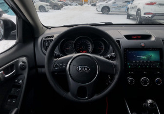 Подержанный автомобиль Kia Cerato Sedan 2011 года (12 фото)