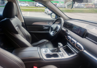 Подержанный автомобиль Jetour X70 2023 года (14 фото)