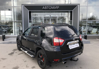 Подержанный автомобиль Nissan Terrano 2014 года (7 фото)