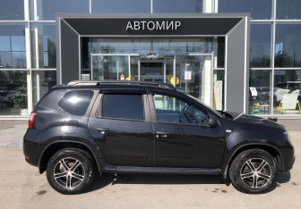 Подержанный автомобиль Nissan Terrano 2015 года (4 фото)