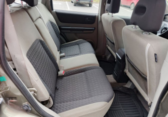 Подержанный автомобиль Nissan X-Trail 2004 года (16 фото)