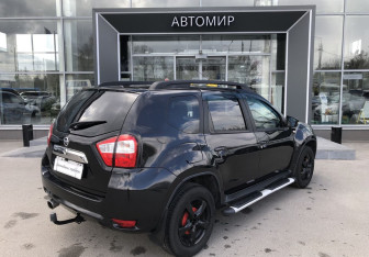 Подержанный автомобиль Nissan Terrano 2014 года (5 фото)
