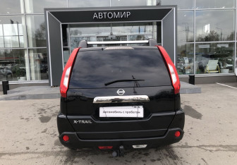 Подержанный автомобиль Nissan X-Trail 2013 года (6 фото)